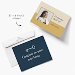 Two business note cards, one from an accounting specialist and one from a realty company. A note says that both flat and folded options are available. 