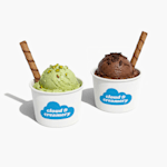 2 paper cups with logos with mint and chocolate ice cream. 