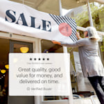 A business owner hanging a vinyl banner promoting a sale, and a customer review: “Great quality, good value for money, and delivered on time”