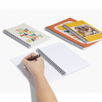Varias libretas personalizadas mostrando fotos y arte en la tapa.