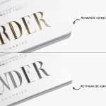 Visittkort med uthevet skrift i gull og sølv som understreker de avrundede og rette hjørnene.