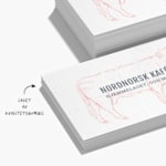 Visittkort for en gourmetrestaurant med en notat om de er laget av bomull av høy kvalitet.