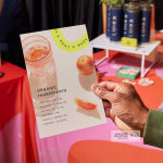 A flat flyer promoting a wellness brand, taken from a stall.