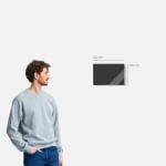 A man standing next to a custom canvas on a wall. Measurements indicate that the size of the canvas is 20 centimetres across and 30 centimetres high. 
